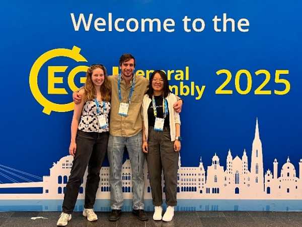Three people in front of panel with EGU 2025 logo