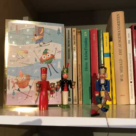 Enlarged view: Advent calendar in book shelf with Christmas figures