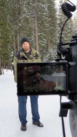 Man in front of camera