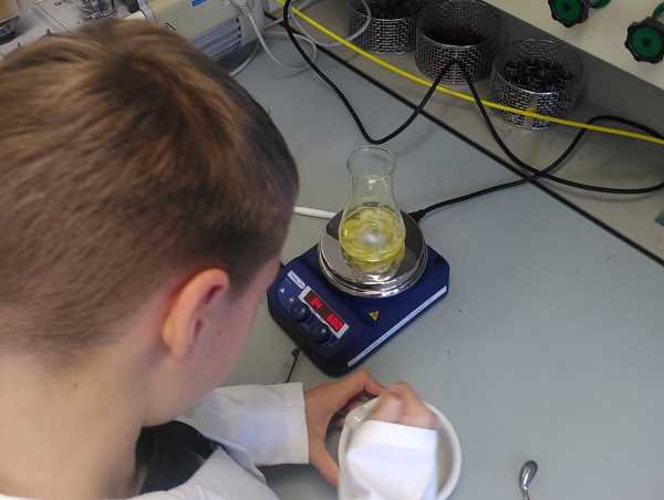 Kid doing extraction of lemon peel