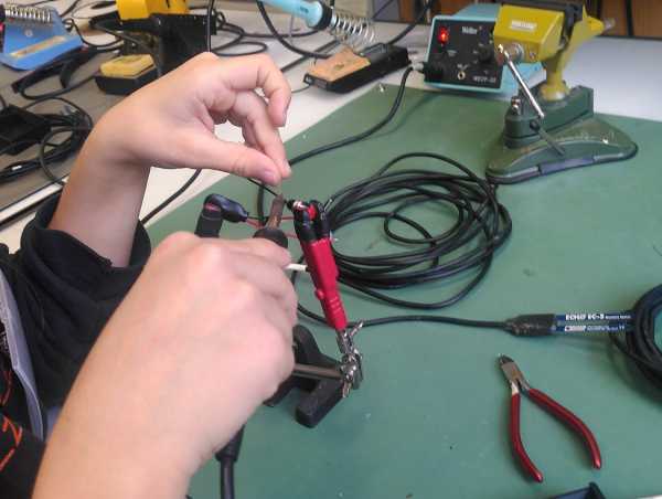 Hands soldering something